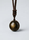 Colgante «Esfera» de obsidiana dorada